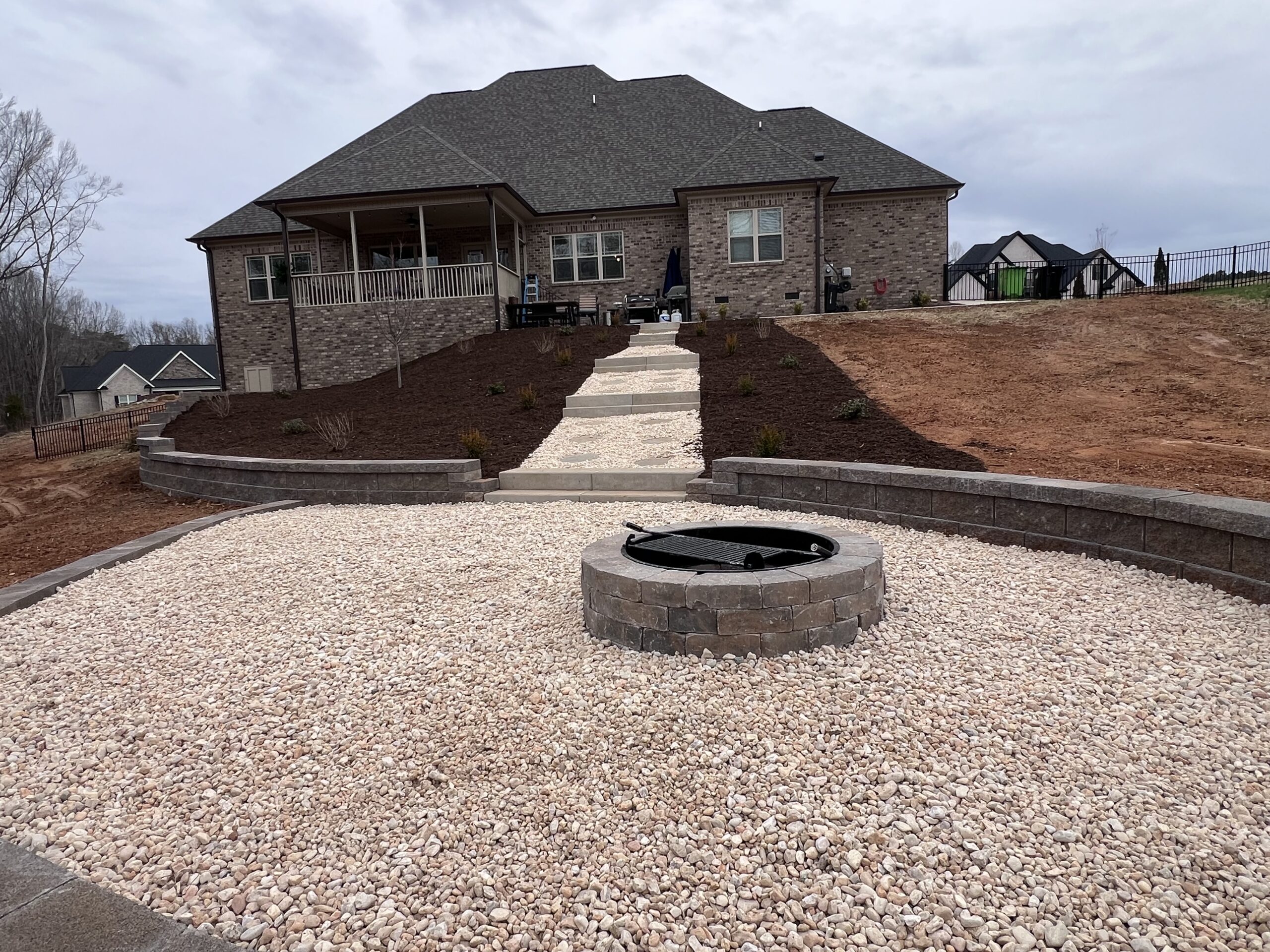 new fire pit steps and wall